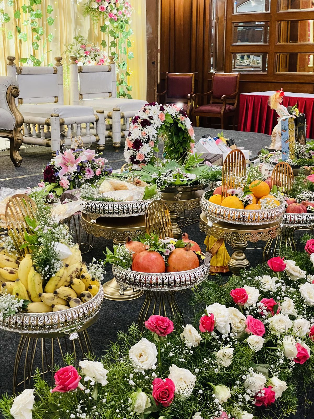 Grand plated decor with fruit trays, florals and traditional setup