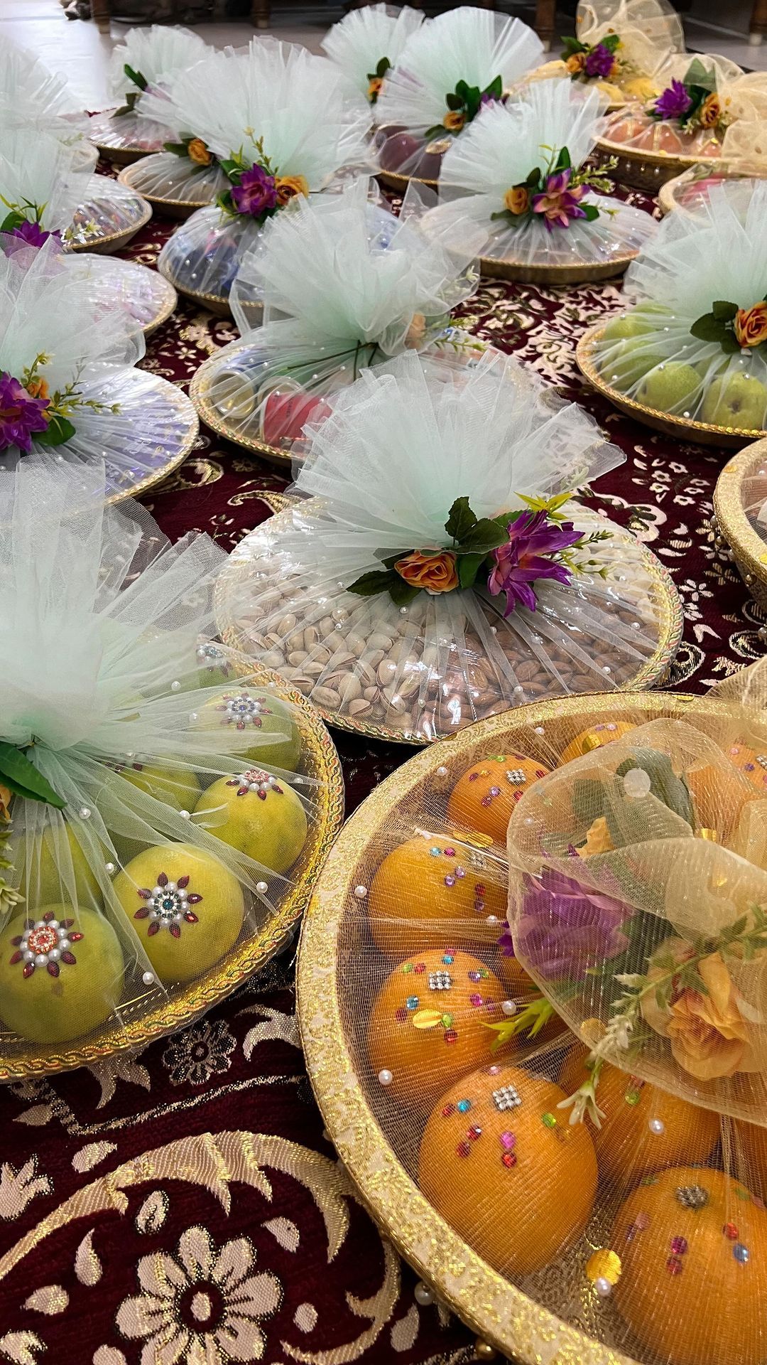 Tulle-wrapped fruit and dry-fruit gift trays