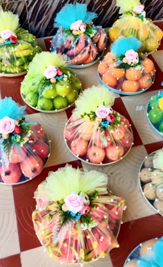 Decorative plated fruit baskets with floral tufts